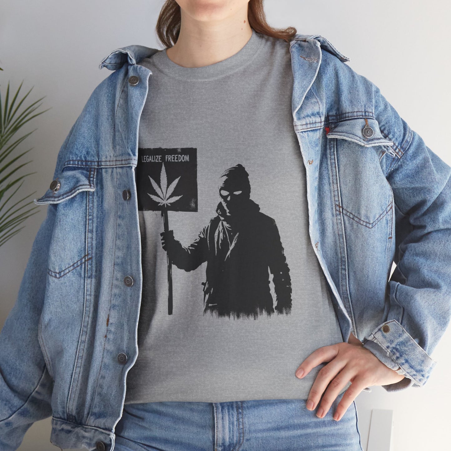 Protester Holding 'Legalize Freedom' Weed Tee